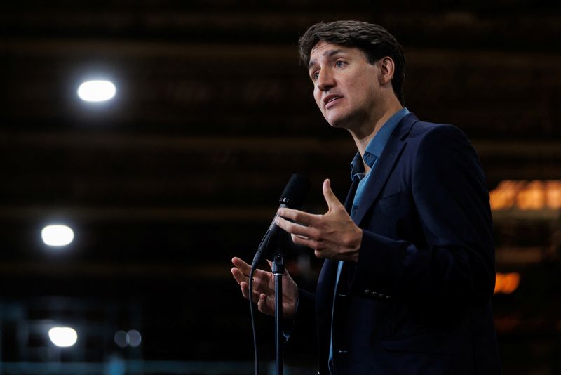 © Reuters. File photo: Canadian Prime Minister Justin Trudeau speaks to the media during an announcement at the Goodyear Canada Inc tire manufacturing plant in Napanee, Ontario, Canada, August 12, 2024. REUTERS/Cole Burston/File Photo