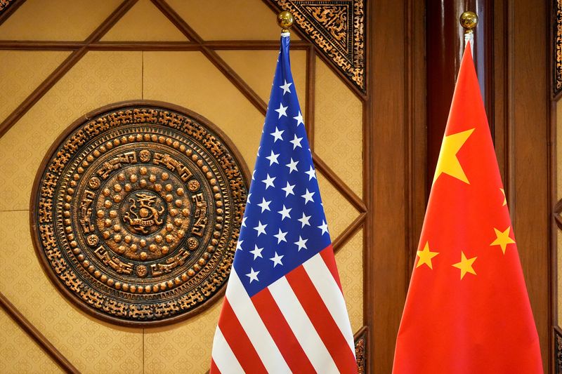 © Reuters. FILE PHOTO: Flags of the U.S. and China sit in a room where U.S. Secretary of State Antony Blinken meets with China's Minister of Public Security Wang Xiaohong at the Diaoyutai State Guesthouse, April 26, 2024, in Beijing, China. Mark Schiefelbein/Pool via REUTERS/File Photo