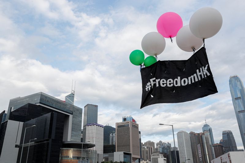 &copy; Reuters. FILE PHOTO: Balloons with protest slogans are seen outside the Legislative Council building during the anniversary of Hong Kong's handover to China in Hong Kong, China July 1, 2019. REUTERS/Tyrone Siu/File Photo