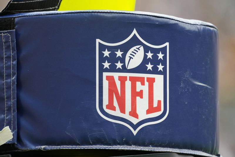 &copy; Reuters. Aug 24, 2024; Green Bay, Wisconsin, USA;  General view of the NFL logo on a goalpost during warmups prior to the game between the Baltimore Ravens and Green Bay Packers at Lambeau Field. Mandatory Credit: Jeff Hanisch-USA TODAY Sports