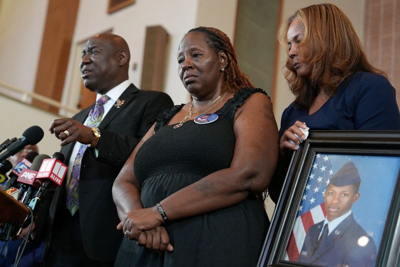 © Reuters. FILE PHOTO: Chantemekki Fortson, mother of U.S. Airman Roger Fortson, listens as Civil Rights Attorney Ben Crump speaks following the firing of Okaloosa County Sheriff Deputy Eddie Duran during a press conference at Mt. Zion Second Baptist Church, in Atlanta, Georgia, U.S., June 3, 2024. Okaloosa County Sheriff Deputy Eddie Duran shot and killed Senior Airman Roger Fortson inside Fortstons home in Florida. REUTERS/Alyssa Pointer/File Photo