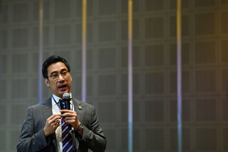 © Reuters. FILE PHOTO: Bank of Thailand Governor Sethaput Suthiwartnarueput speaks during his first briefing on the economy and monetary policy after taking office in Bangkok, Thailand October 20, 2020. REUTERS/Chalinee Thirasupa