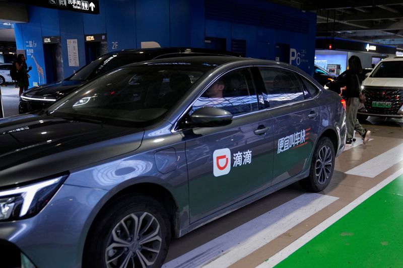 &copy; Reuters. A car of Chinese ride-hailing service Didi is seen at the Shanghai Hongqiao International Airport in Shanghai, China August 14, 2023. REUTERS/Aly Song/File Photo