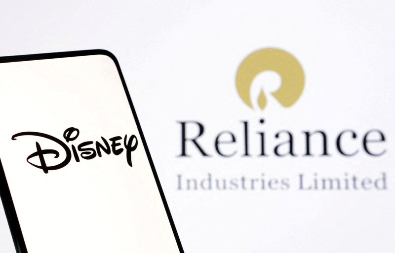 © Reuters. FILE PHOTO: The Disney and Reliance logos are seen in this illustration taken December 15, 2023. REUTERS/Dado Ruvic/Illustration/File Photo