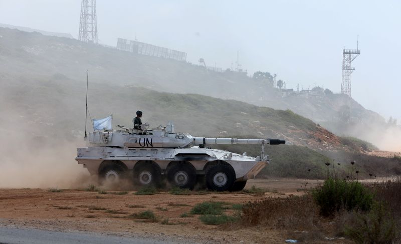 © Reuters. A United Nations peacekeeper (UNIFIL) is pictured on a UN armoured vehicle in Naqoura, near the border with Israel, southern Lebanon, August 31, 2023. REUTERS/Aziz Taher/File Photo