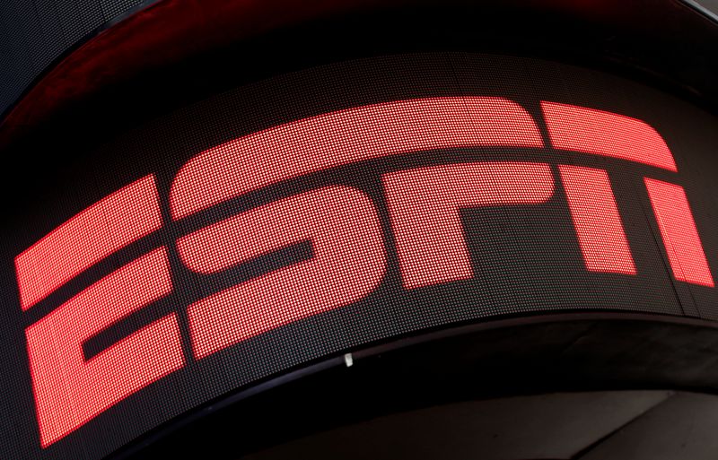 &copy; Reuters. FILE PHOTO: The ESPN logo is seen on an electronic display in Times Square in New York City, U.S., August 23, 2017.  REUTERS/Mike Segar/File Photo