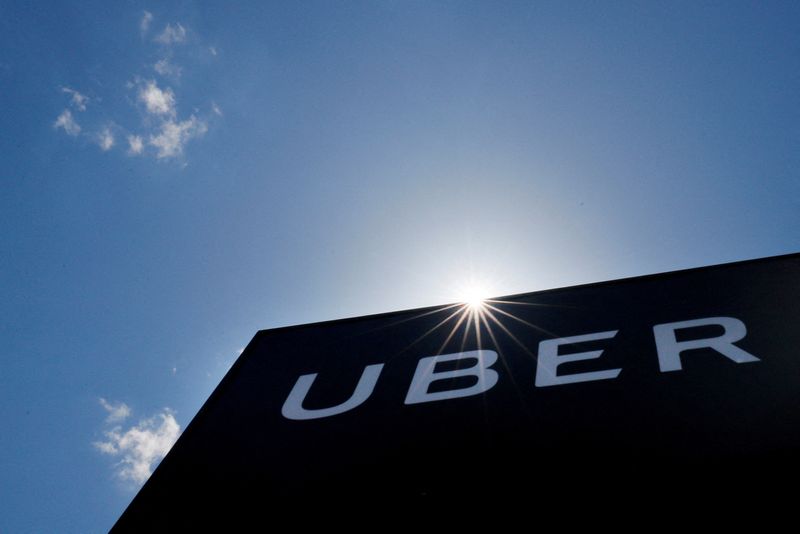 &copy; Reuters. FILE PHOTO: A sign marks the offices of Uber in Saugus, Massachusetts, U.S., May 8, 2019.   REUTERS/Brian Snyder/File Photo