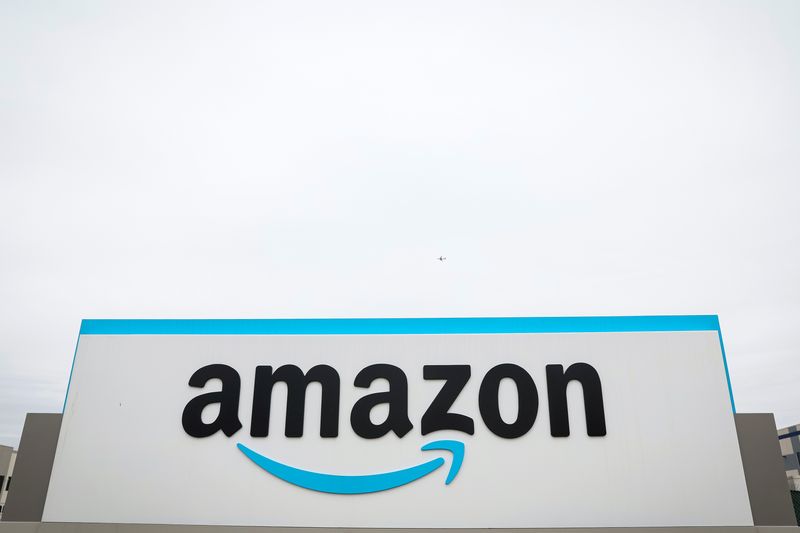 © Reuters. FILE PHOTO: The Amazon logo is displayed on a sign outside the company's LDJ5 sorting center in the Staten Island borough of New York, U.S., April 25, 2022. REUTERS/Brendan McDermid/File Photo