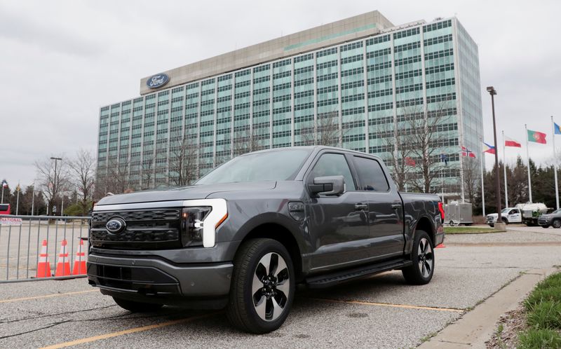 &copy; Reuters. FILE PHOTO: A model of the all-new Ford F-150 Lightning electric pickup is parked in front of the Ford Motor Company World Headquarters in Dearborn, Michigan, U.S. April 26, 2022. REUTERS/Rebecca Cook/File Photo