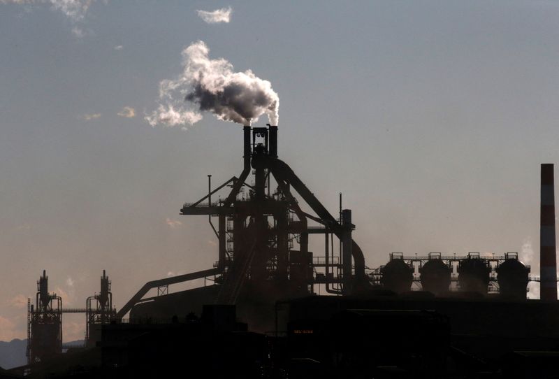 &copy; Reuters. FILE PHOTO: Chimneys of a steel factory are pictured at an industrial area in Kawasaki, Japan, January 16, 2017. REUTERS/Kim Kyung-Hoon/File Photo