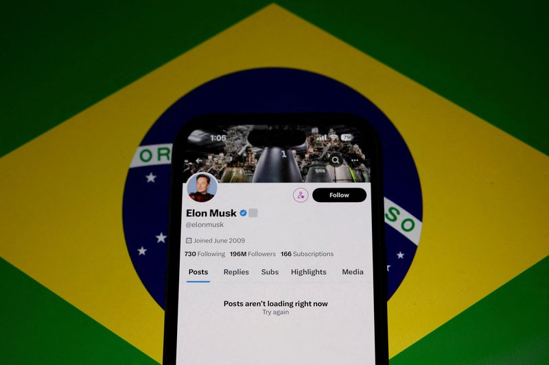 &copy; Reuters. The X account of Elon Musk in seen blocked on a mobile screen in this illustration after Brazil's telecommunications regulator suspended access to Elon Musk's X social network in the country to comply with an order from a judge who has been locked in a mo