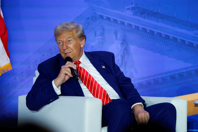 &copy; Reuters. Republican presidential nominee and former U.S. President Donald Trump participates in a fireside chat during the Moms for Liberty National "Joyful Warriors" Summit, in Washington, U.S., August 30, 2024. REUTERS/Evelyn Hockstein/File Photo