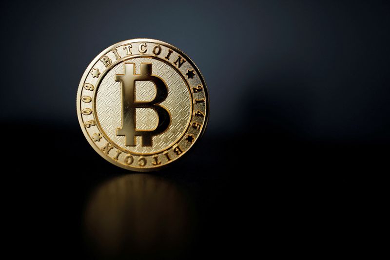 &copy; Reuters. A bitcoin is seen in an illustration picture taken at La Maison du Bitcoin in Paris, France, June 23, 2017. REUTERS/Benoit Tessier/File Photo