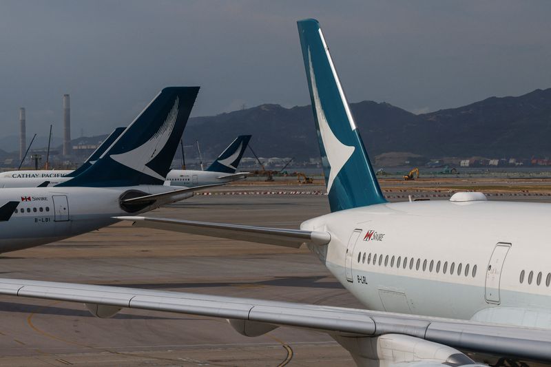 &copy; Reuters. Cathay Pacific aircraft are seen parked at Hong Kong International Airport in Hong Kong, China August 10, 2024. REUTERS/Tyrone Siu/File Photo