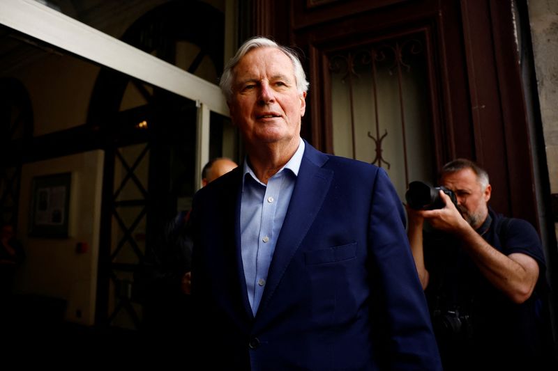 © Reuters. FILE PHOTO: Michel Barnier of the French conservative party Les Republicains (The Republicans - LR) arrives to attend an emergency meeting called by LR party chiefs in Paris, following their leader Eric Ciotti's decision to form an alliance between his party's candidates and the far-right National Rally (Rassemblement National - RN) in a snap parliamentary election, France, June 12, 2024. REUTERS/Sarah Meyssonnier/File Photo