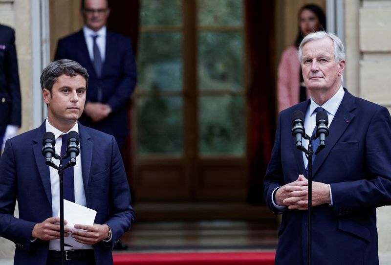 &copy; Reuters. France newly appointed Prime minister Michel Barnier and outgoing Prime minister Gabriel Attal attend the handover ceremony at the Hotel Matignon in Paris, France, September 5, 2024. Stephane De Sakutin/Pool via REUTERS