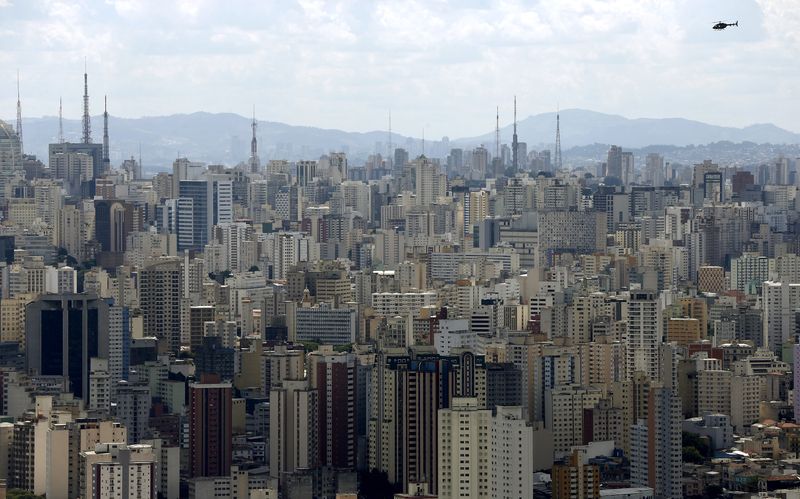 &copy; Reuters. FILE PHOTO: A helicopter flies over the skyline of Sao Paulo February 12, 2015. REUTERS/Paulo Whitaker/File Photo