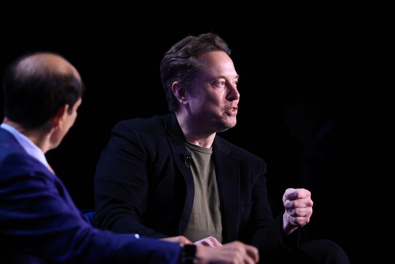 &copy; Reuters. FILE PHOTO: Michael Milken, Chairman of Milken Institute, converses with Elon Musk, Chief Executive Officer of SpaceX and Tesla and owner of X at the Milken Conference 2024 Global Conference Sessions at The Beverly Hilton in Beverly Hills, California, U.S