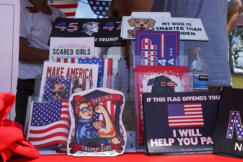 &copy; Reuters. FILE PHOTO: Stickers sit at the Cobb County Republican Party's booth at the Pigs and Peaches country festival in Kennesaw, Georgia, U.S. August 17, 2024.  REUTERS/Megan Varner/File Photo