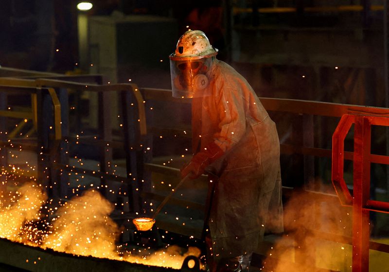 &copy; Reuters. FILE PHOTO: A worker processes platinum group metal (PGM) ores at a smelter complex during a visit by U.S. Deputy Treasury Secretary Wally Adeyemo at a platinum mine owned by Sibanye Stillwater, as part of his five-day visit to the country, in Marikana, o