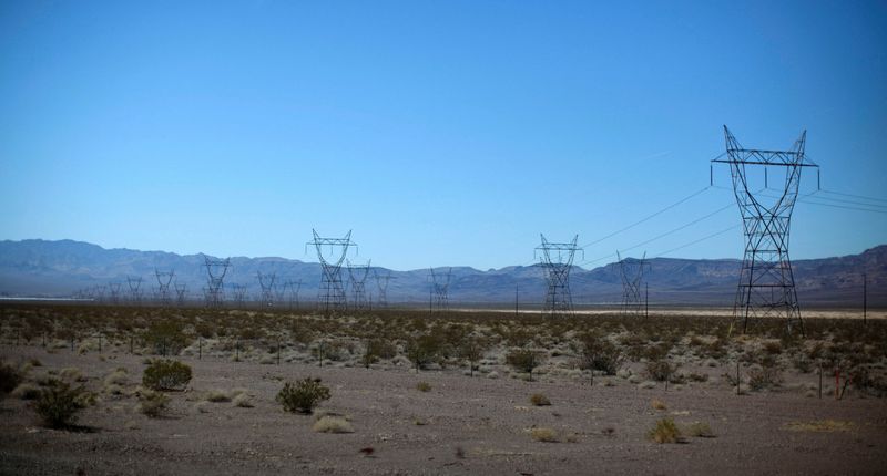 &copy; Reuters. FILE PHOTO: Electricity transmission towers are seen in the Nevada desert near the Copper Mountain Solar Project, in Boulder City, Nevada March 21, 2012. REUTERS/Jason Reed/File Photo