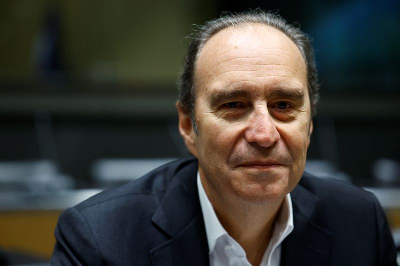 &copy; Reuters. French telecoms tycoon Xavier Niel poses before a hearing of the French parliament's commission of inquiry into the allocation, content and control of authorisations for national television services on digital terrestrial television at the National Assemb