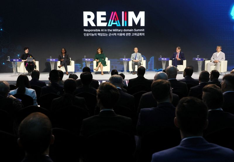 © Reuters. Speakers including Dr. Radha Plumb, Chief Digital and Artificial Intelligence Officer, U.S. Department of Defense (third from left), discuss responsible AI use in a plenary session at the Responsible AI in the Military domain (REAIM) summit in Seoul, South Korea, September 9, 2024.   Yonhap via REUTERS