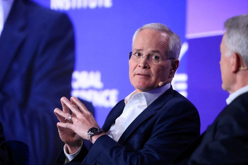 © Reuters. FILE PHOTO: Darren Woods, chairman and CEO, Exxon Mobil Corporation, speaks at the Milken Conference 2024 global conference sessions at the Beverly Hilton in Beverly Hills, California, U.S., May 6, 2024. REUTERS/David Swanson/File Photo