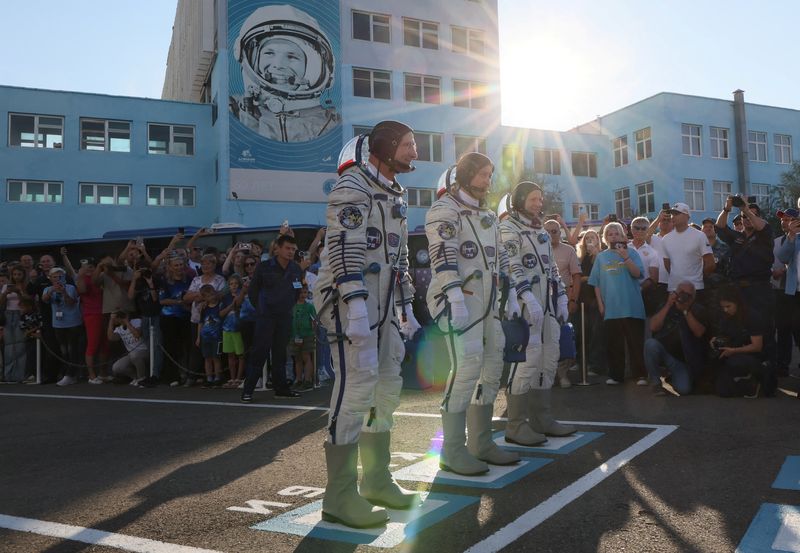 Spacecraft carrying Russians and American takes off from Baikonur cosmodrome