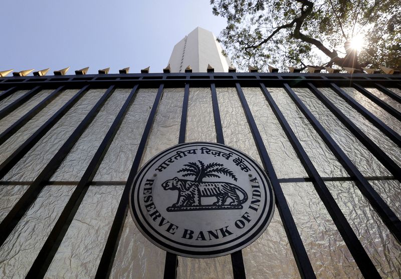 © Reuters. FILE PHOTO: The Reserve Bank of India (RBI) seal is pictured on a gate outside the RBI headquarters in Mumbai, India, February 2, 2016. REUTERS/Danish Siddiqui/File Photo