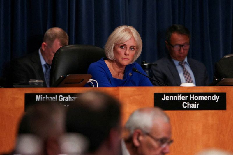 © Reuters. FILE PHOTO: National Transportation Safety Board Chair Jennifer Homendy attends a NTSB hearing on the Alaska Airlines Boeing 737 MAX door accident at NTSB headquarters in Washington, U.S., August 6, 2024. REUTERS/Kaylee Greenlee Beal/File Photo