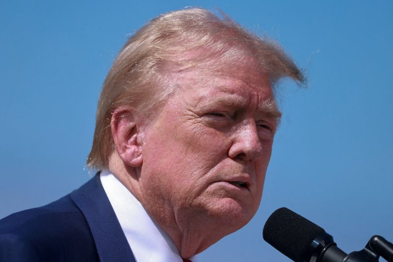 © Reuters. FILE PHOTO: Republican presidential nominee and former U.S. President Donald Trump attends a press conference at Trump National Golf Club, in Rancho Palos Verdes, U.S., September 13, 2024. REUTERS/David Swanson/File Photo