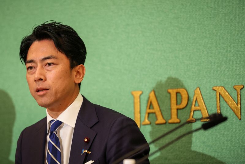 &copy; Reuters. TOKYO, JAPAN - SEPTEMBER 14: Former environment minister Shinjiro Koizumi, a candidate for Japan’s ruling Liberal Democratic Party’s (LDP) presidential election, speaks during a debate at the Nixon Kisha Club in Tokyo, Japan. Takashi Aoyama/Pool via R