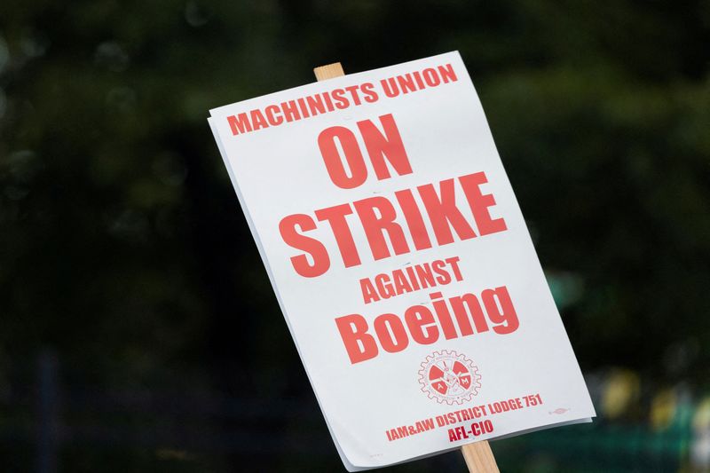 © Reuters. FILE PHOTO: Signage seen on a picket line during the first day of a strike near the entrance of a production facility in Renton, Washington, U.S., September 13, 2024. REUTERS/Matt Mills McKnight/File Photo