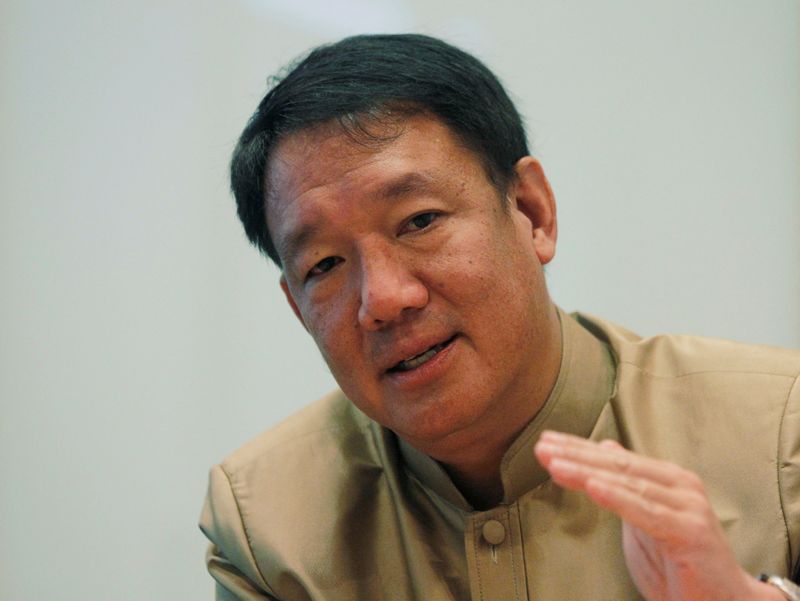 &copy; Reuters. FILE PHOTO: Thailand's Deputy Prime Minister and Minister of Finance Kittirat Na Ranong gestures during an interview with Reuters at the Ministry of Finance in Bangkok December 3, 2012. REUTERS/Chaiwat Subprasom/File Photo