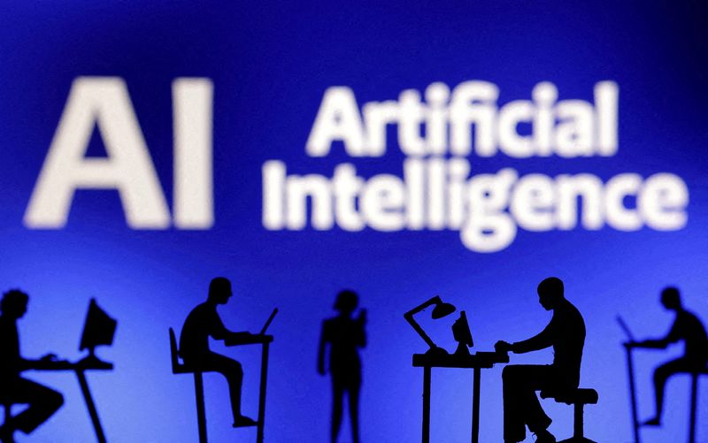 &copy; Reuters. Ilustração mostra estatuetas com computadores e celulares em frente às palavras "IA Inteligência Artificial" n19/02/2024nREUTERS/Dado Ruvic