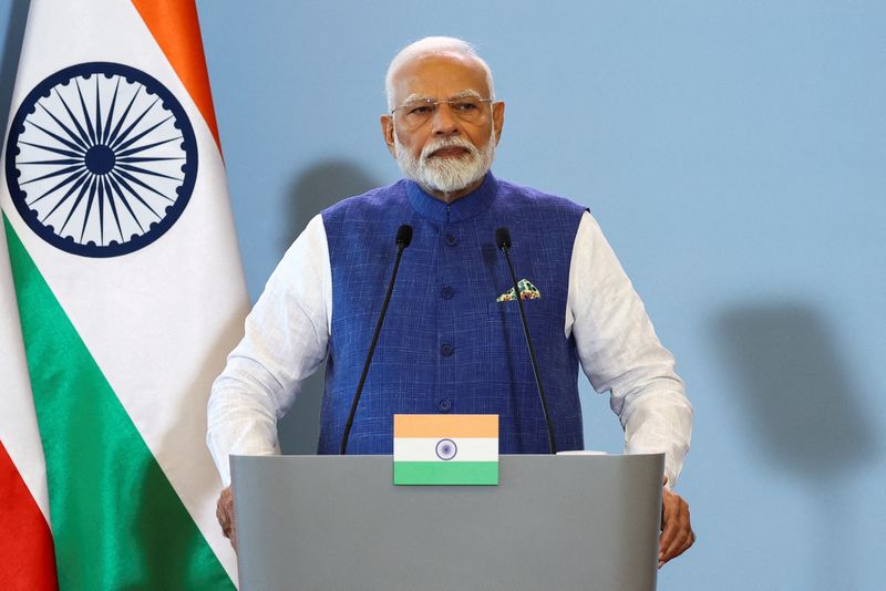 © Reuters. FILE PHOTO: Indian Prime Minister Narendra Modi attends a press conference with Polish Prime Minister Donald Tusk (not pictured) at the Chancellery of the Prime Minister in Warsaw, Poland, August 22, 2024.REUTERS/Kacper Pempel/File Photo