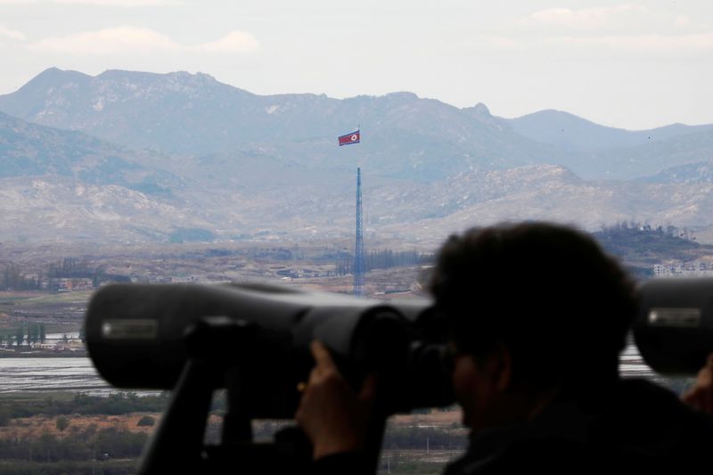 © Reuters. A North Korean flag flutters on top of a 160-metre tower in North Korea's propaganda village of Gijungdong in this picture taken from the Dora observatory near the demilitarised zone separating the two Koreas, in Paju, South Korea, April 24, 2018. REUTERS/Kim Hong-Ji/File Photo