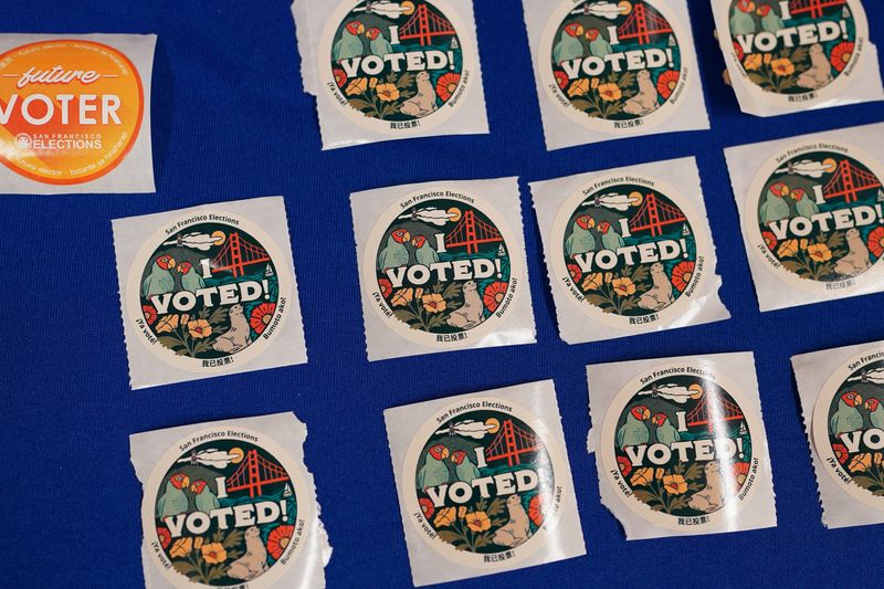 &copy; Reuters. Stickers for voters are displayed next to an official ballot drop box during early voting, a day ahead of the Super Tuesday primary election, at the San Francisco City Hall voting center in San Francisco, California, U.S. March 4, 2024. REUTERS/Loren Elli