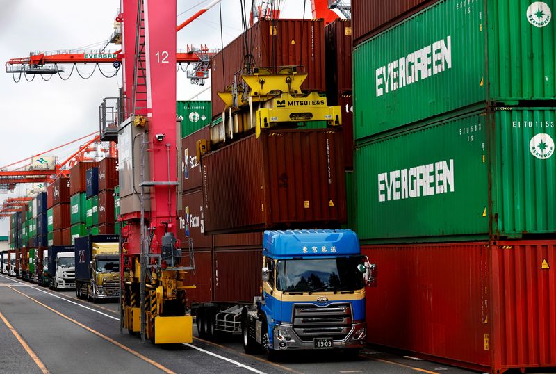 &copy; Reuters. FILE PHOTO: Stacked containers are seen at an industrial port in Tokyo, Japan February 15, 2024.  REUTERS/Issei Kato/File Photo