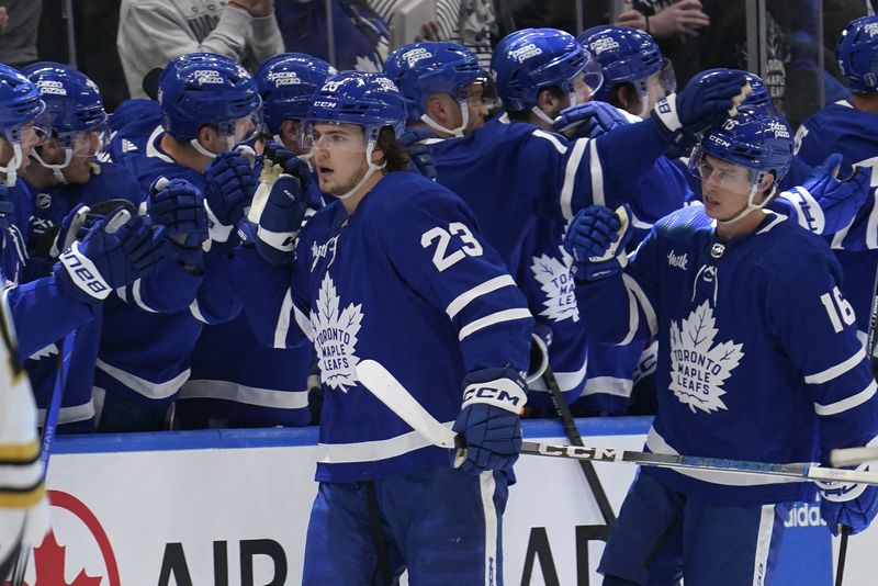 © Reuters. FILE PHOTO: Apr 24, 2024; Toronto, Ontario, CAN; Toronto Maple Leafs forward Matthew Knies (23) gets congratulated after a goal against the Boston Bruins during the second period of game three of the first round of the 2024 Stanley Cup Playoffs at Scotiabank Arena. Mandatory Credit: John E. Sokolowski-USA TODAY Sports/File Photo