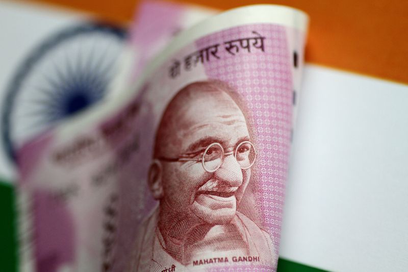 &copy; Reuters. FILE PHOTO: An India Rupee note is seen in this illustration photo June 1, 2017. REUTERS/Thomas White/Illustration/File Photo