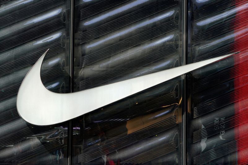 © Reuters. FILE PHOTO: The Nike swoosh logo is seen outside the store on 5th Ave in New York, New York, U.S., March 19, 2019.   REUTERS/Carlo Allegri/File Photo