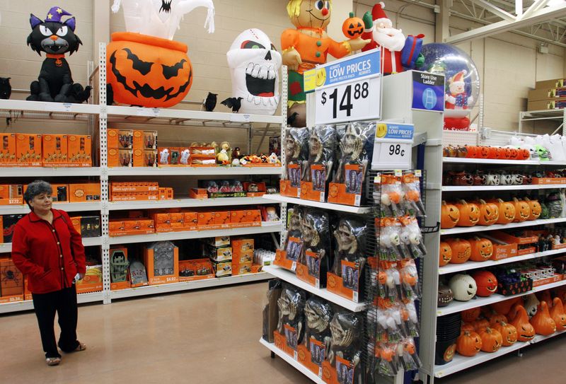 &copy; Reuters. FILE PHOTO: A customer looks at Halloween merchandise in Chicago in this file photo. REUTERS/Joshua Lott/ File Photo