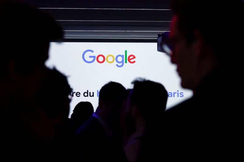 &copy; Reuters. FILE PHOTO: People are silhouetted in front of a Google logo during the inauguration of a new hub in France dedicated to the artificial intelligence (AI) sector, at the Google France headquarters in Paris, France, February 15, 2024.  REUTERS/Gonzalo Fuent