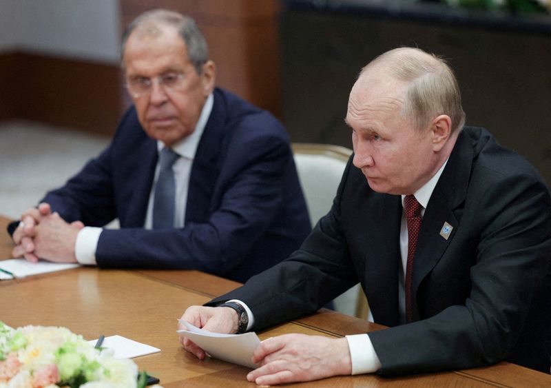 © Reuters. FILE PHOTO: Russian President Vladimir Putin and Foreign Minister Sergei Lavrov at a meeting on the sidelines of Shanghai Cooperation Organization summit in Astana, Kazakhstan July 4, 2024. Sputnik/Gavriil Grigorov/Pool via REUTERS