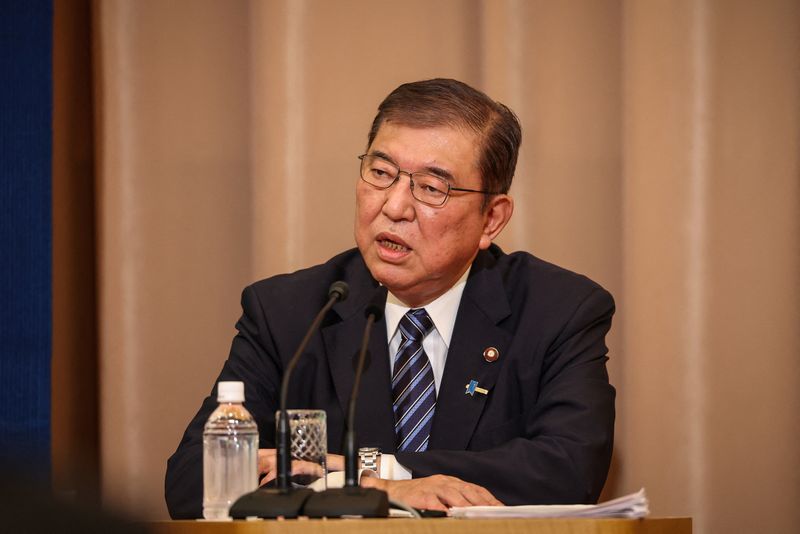 © Reuters. FILE PHOTO: Former defence minister Shigeru Ishiba, a candidate for Japan’s ruling Liberal Democratic Party’s (LDP) presidential election, speaks during a debate at the Nixon Kisha Club in Tokyo, Japan. September 14, 2024. Takashi Aoyama/Pool via REUTERS/File Photo