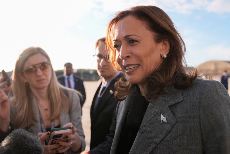 © Reuters. FILE PHOTO: Democratic presidential nominee Vice President Kamala Harris speaks to members of the media upon her arrival at Andrews Air Force Base, Maryland, U.S., September 22, 2024. Matt Rourke/Pool via REUTERS/File Photo