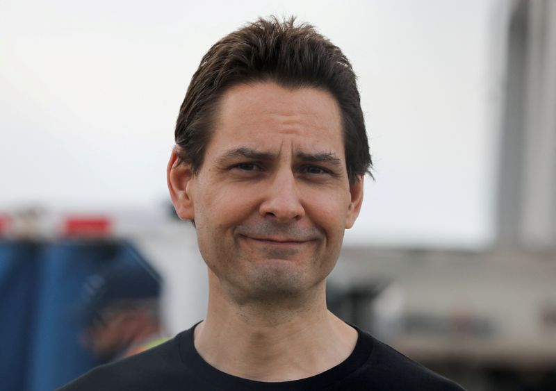 &copy; Reuters. FILE PHOTO: Former diplomat Michael Kovrig reacts following his arrival on a Canadian air force jet after his release from detention in China, at Pearson International Airport in Toronto, Ontario, Canada September 25, 2021. REUTERS/Chris Helgren/File Phot