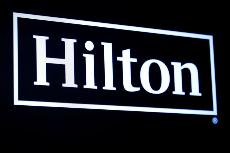 &copy; Reuters. The Hilton logo is displayed on a screen on the floor of the New York Stock Exchange (NYSE) in New York, U.S., May 29, 2019. REUTERS/Brendan McDermid/File Photo